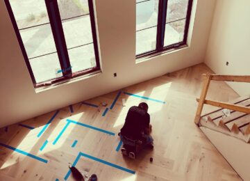 White oak floor install Sun Bay Builders
